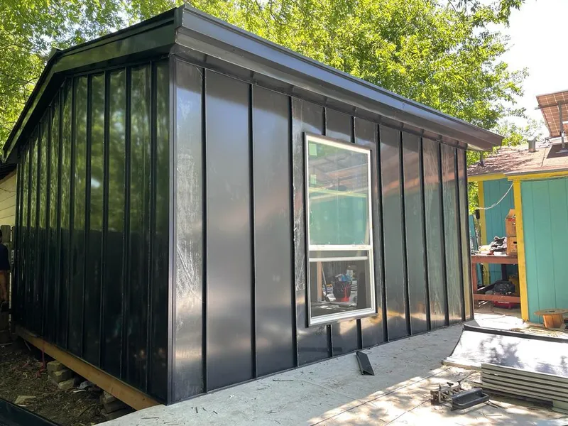 Black standing seam metal wall panels for Metal Roof Installation in Randolph